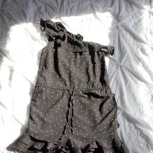 One shoulder black ruffled polka dot romper